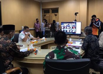 Rapat koordinasi virtual jajaran di Kabupaten OKI, Jumat (08/05). (IST / Diskominfo OKI)