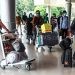 Calon penumpang berdatangan di Bandara Internasional SMB II. (matakamera/fornews.co/mushaful imam)