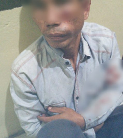 Erwin Saputra, pelaku pencurian di Perumahan Cluster Almond, Jakabaring, saat diamankan di Polsek SU I Palembang, Minggu (10/05). (fornews.co/ist)