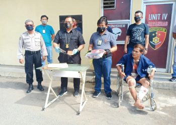 Tersangka saat dihadirkan dalam rilis di Mapolda Sumsel. Foto: Istimewa