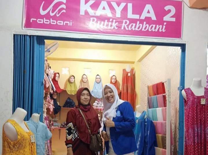 Salah satu los pasar bertingkat Kayuagung yang diisi oleh pedagang pakaian. (IST)