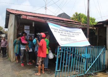 Posko kebakaran yang didirikan Dinas Sosial Kota Palembang bersama warga sekitar untuk membantu penyaluran bantuan korban kebakaran di Pasar Gubah, Kecamatan Bukit Kecil. (fornews.co/bakohumas palembang)