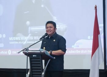 Gubernur Sumsel, Herman Deru, saat berbicara pada Muswil VI APTISI Wilayah II A Sumsel Bangka Belitung, di Hotel Harper, Selasa (22/3/2022). (fornews.co/humas pemprov sumsel)