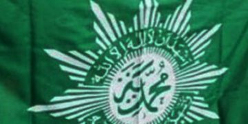 BENDER Muhanmadiyah berlambang lafadz dua kalimah syahadat yabg di tengahnya terdapat tulisan Muhammadiyah dalam huruf arab yang berarti para pengikut Rasulullaah Muhammad Shalallaahu 'Alayhi Wassallam. (foto fornews.co/muhammdiyah)