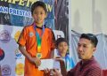 Atlet panjat dinding WPSCC, Dino Pramana Dipa, usai pengalungan medali emas pada kategori Lead U-13 Putra. (fornews.co/ist)